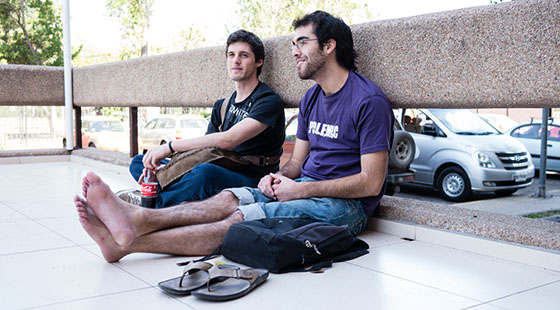 NYU students sitting on the ground